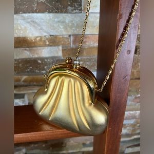 Gold colored metal clutch with chain
